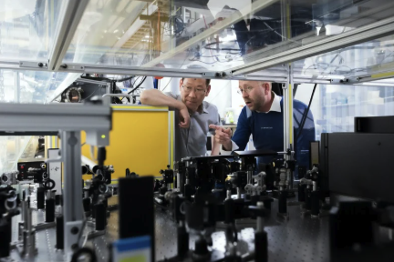 Two engineers discussing equipment